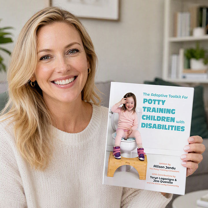 Woman holding The Adaptive Toolkit